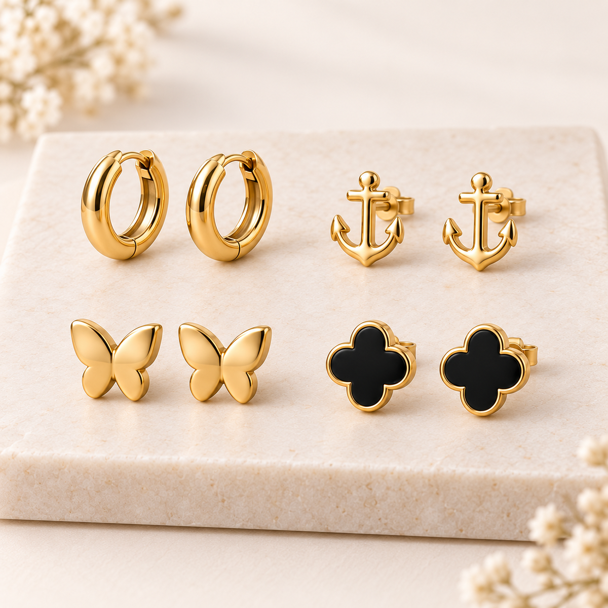 Pack de 4 pares de pendientes sobre fondo claro
