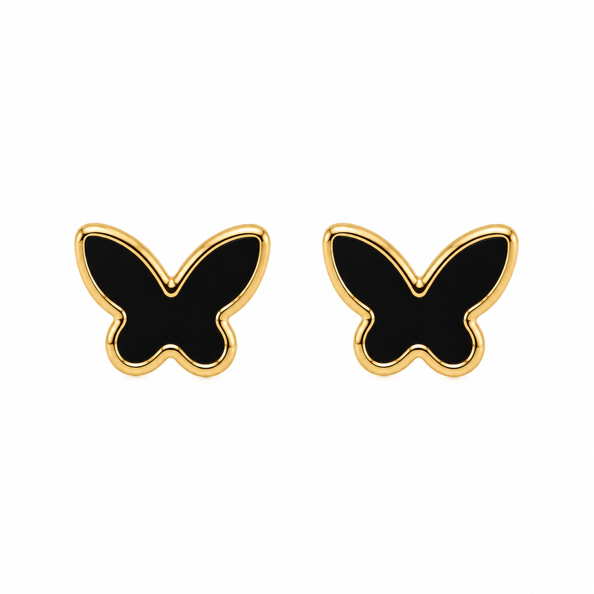 Par de pendientes de mariposa negros y dorados sobre fondo blanco
