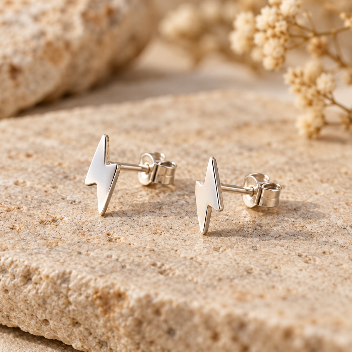 Pendientes rayos plateados vista lateral